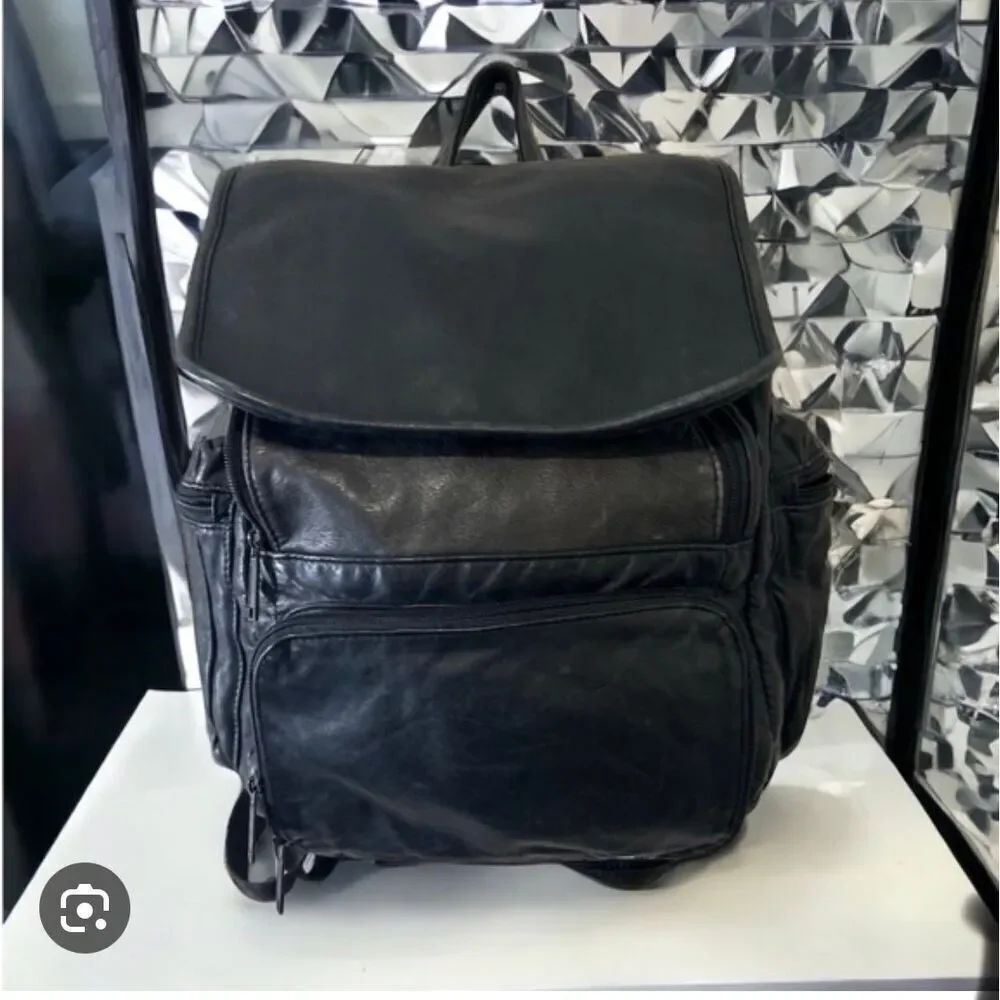 M Wilsons leather og vintage black leather minibag mini backpack